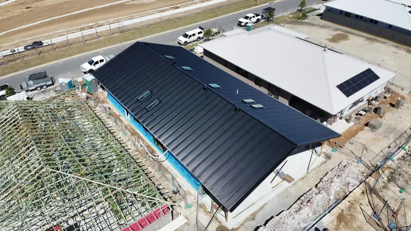Aerial view along the dark roof and guttering on the Cooranbong job
