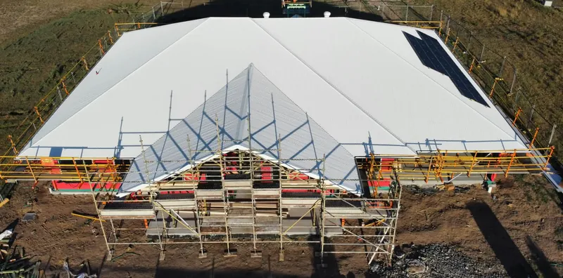 Front gable of the finished Surfmist roof, with scaffolding, in Tingira Heights